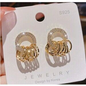 Silver Circle with CZs & 7 Lucky Gold dangling Circles Earrings